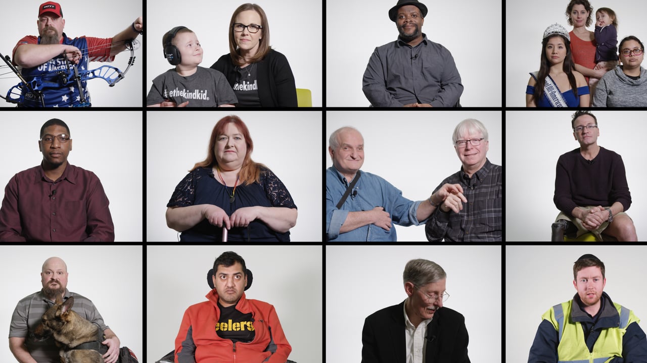 Composite video thumbnail of twelve different people with disabilites. Some are with their families. Some are signing. One has a bow and arrow, one has a cane, one is a a wheelchair, and one has a dog.